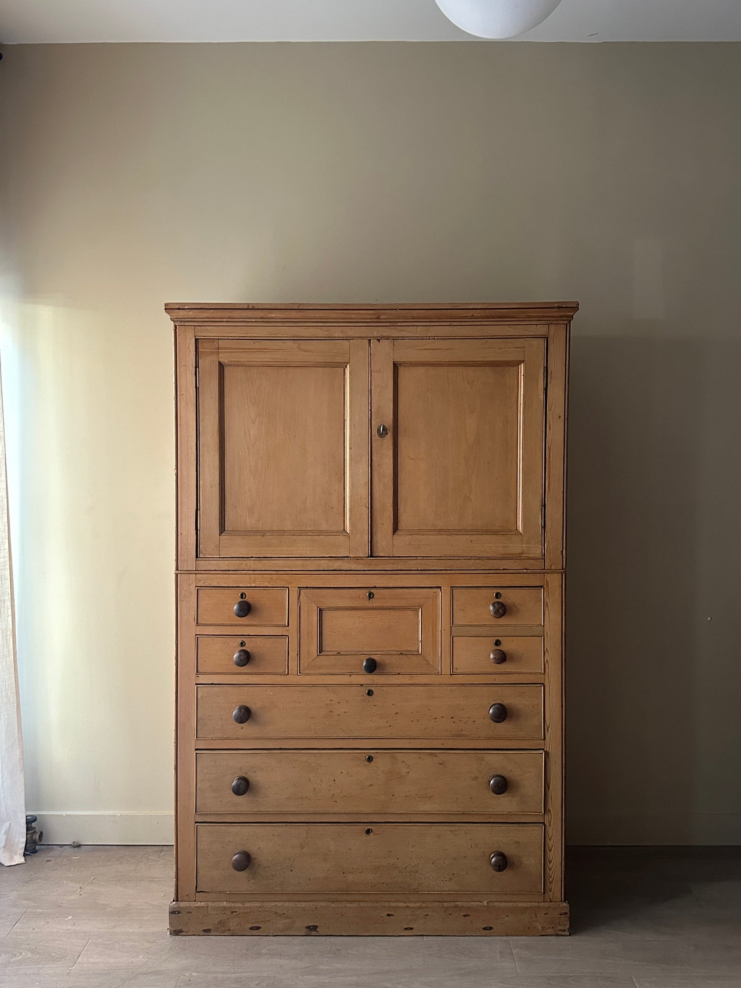 19th c. pine cabinet with updated sliding door mechanism.