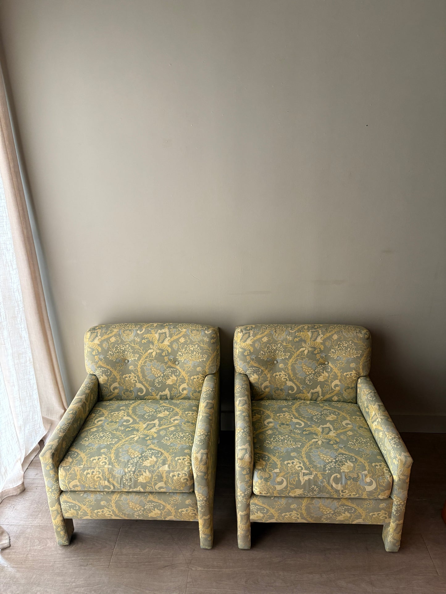 Directional green floral upholstered lounge chairs. Sold individually.
