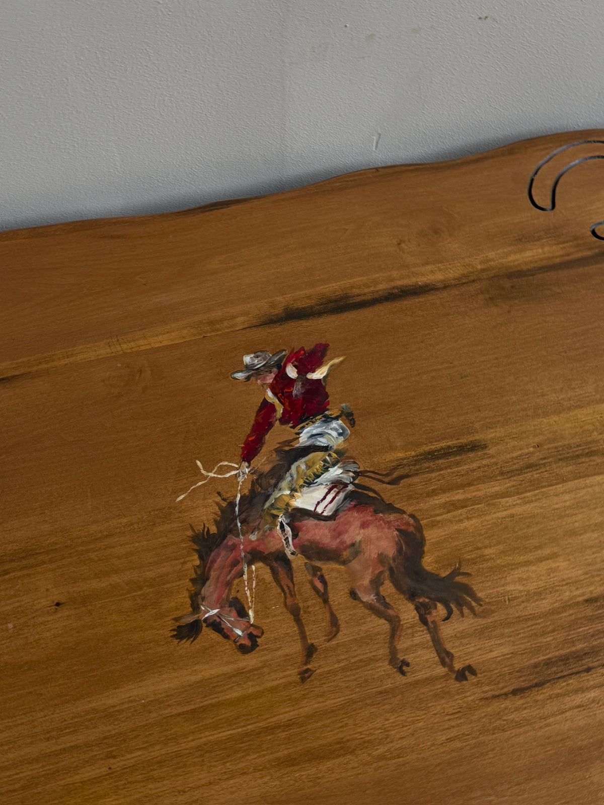 Pine coffee table with equestrian motifs