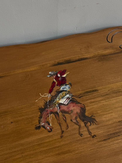 Pine coffee table with equestrian motifs