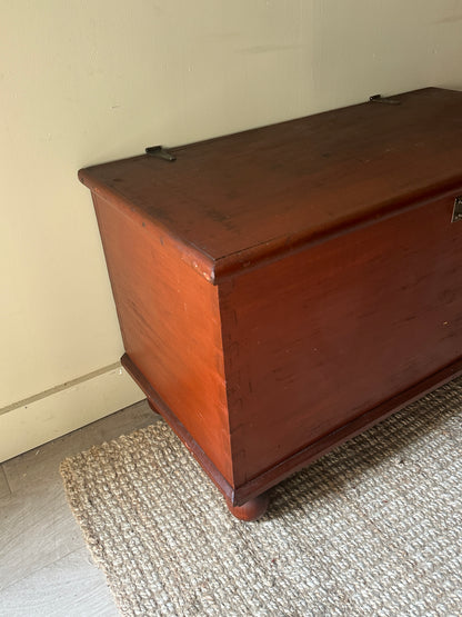 Red ball foot chest