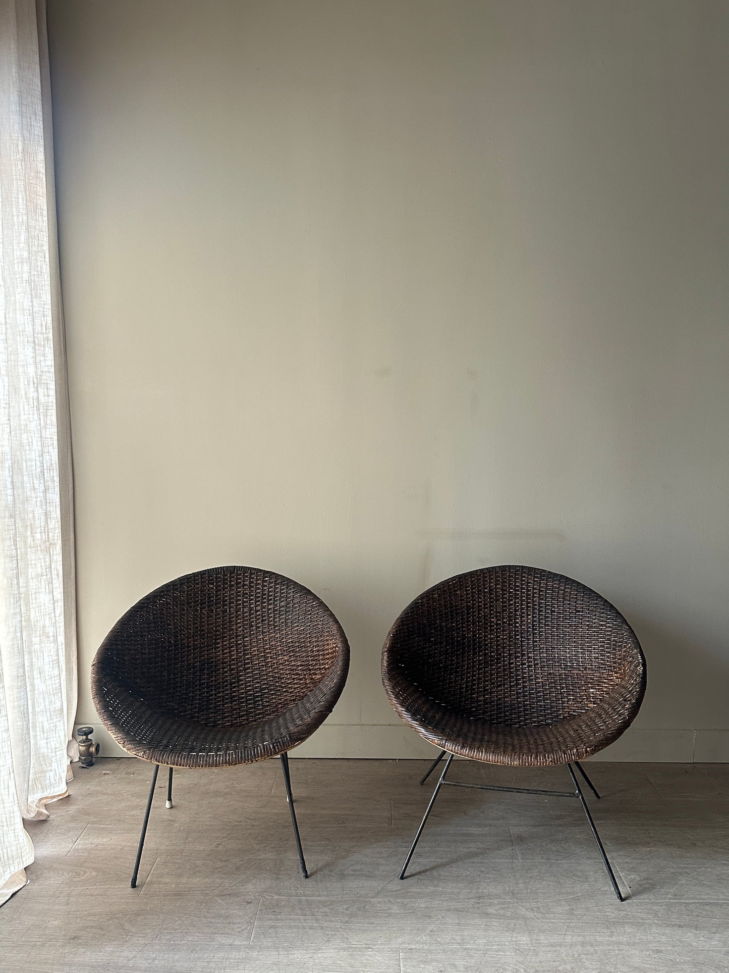 Woven rattan hoop chairs. Sold individually.