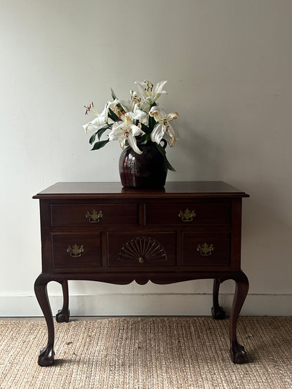 Carved mahogany console table