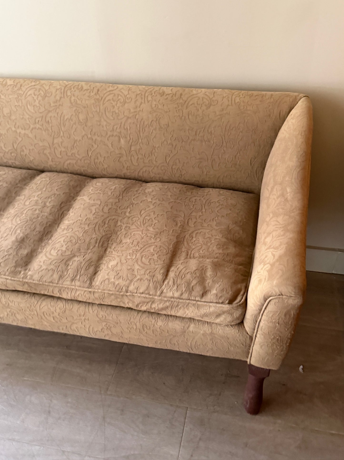 Damask upholstered settee with turned walnut legs