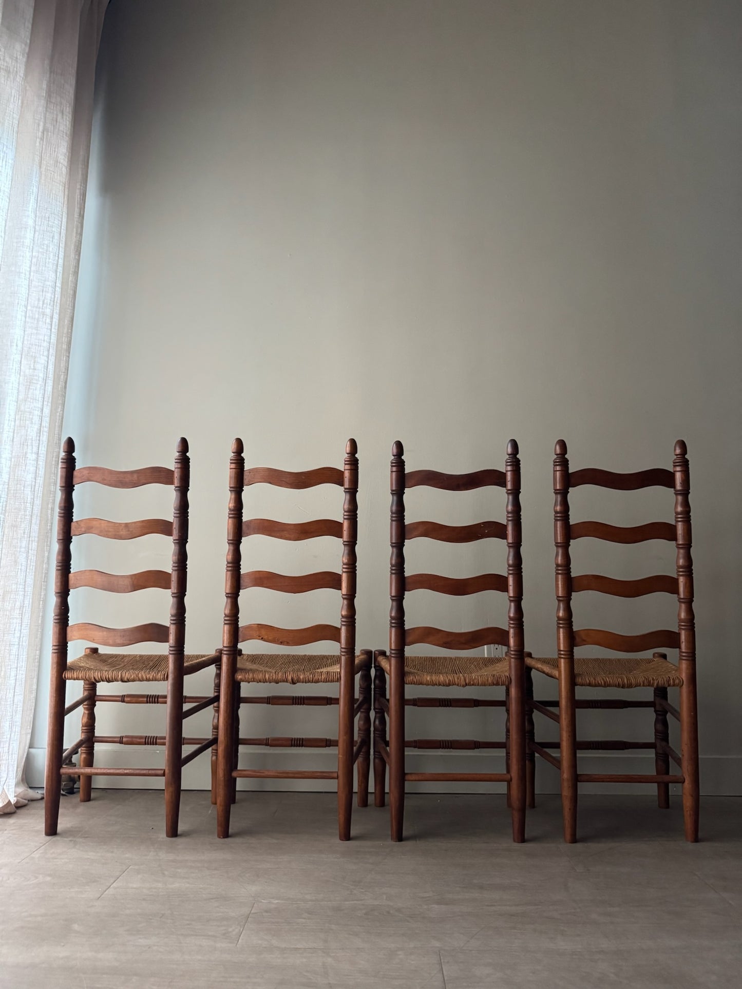Maple ladder back rush seat chairs. Sold in pairs.