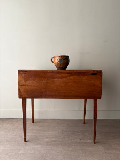 Inlaid walnut drop leaf table