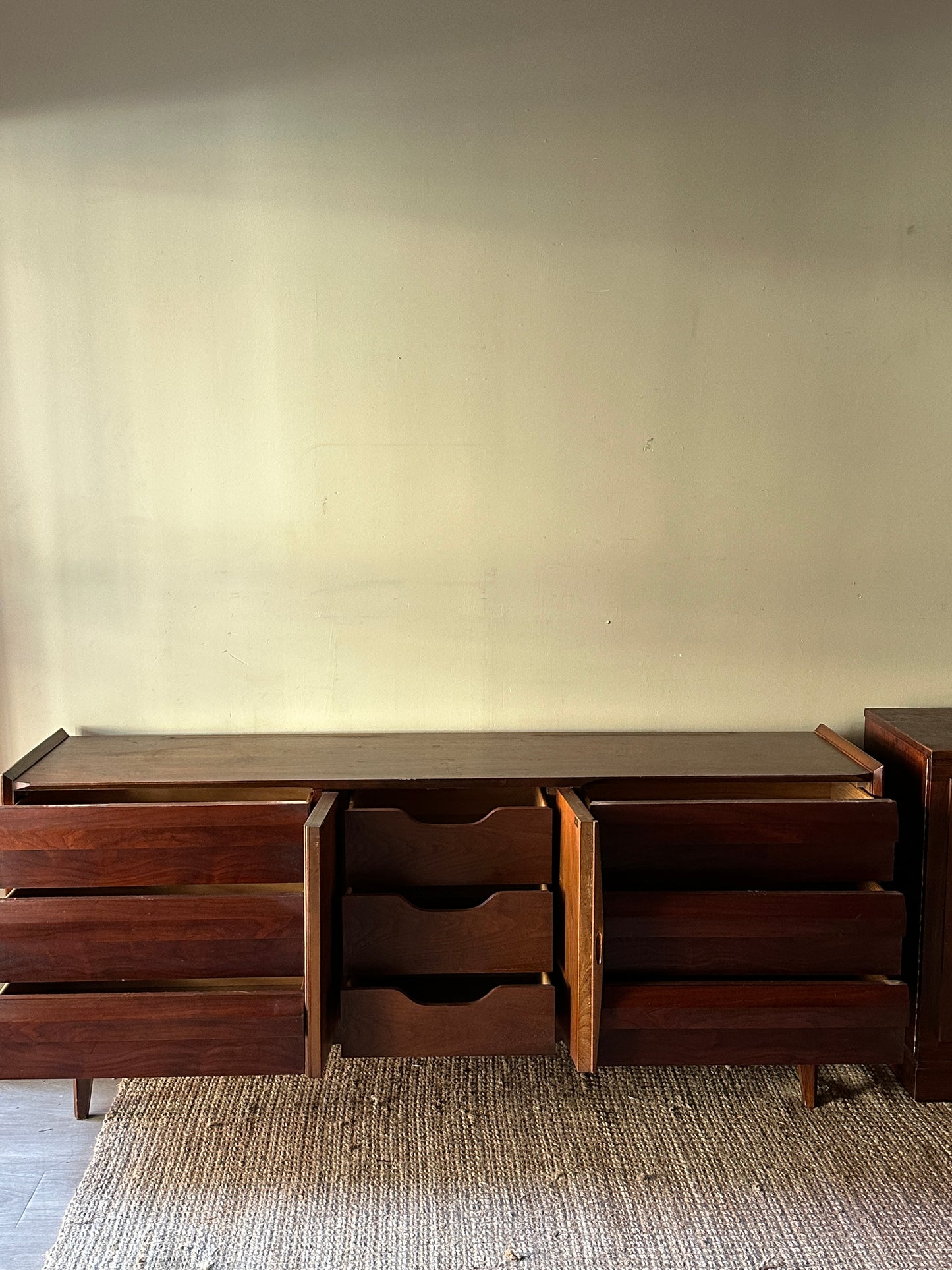 Walnut credenza with fluted doors