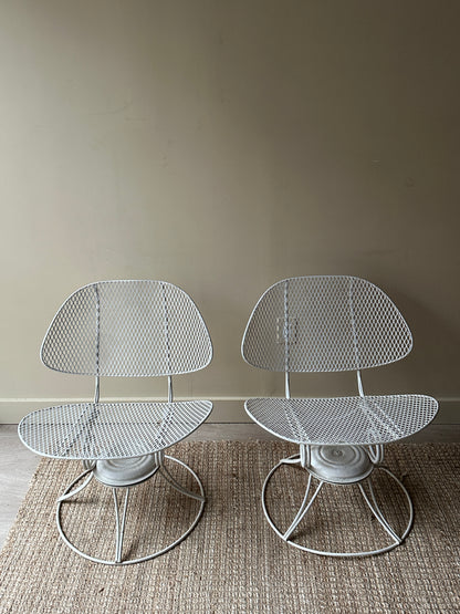 Homecrest metal clam shell swivel chairs. Sold as a set.