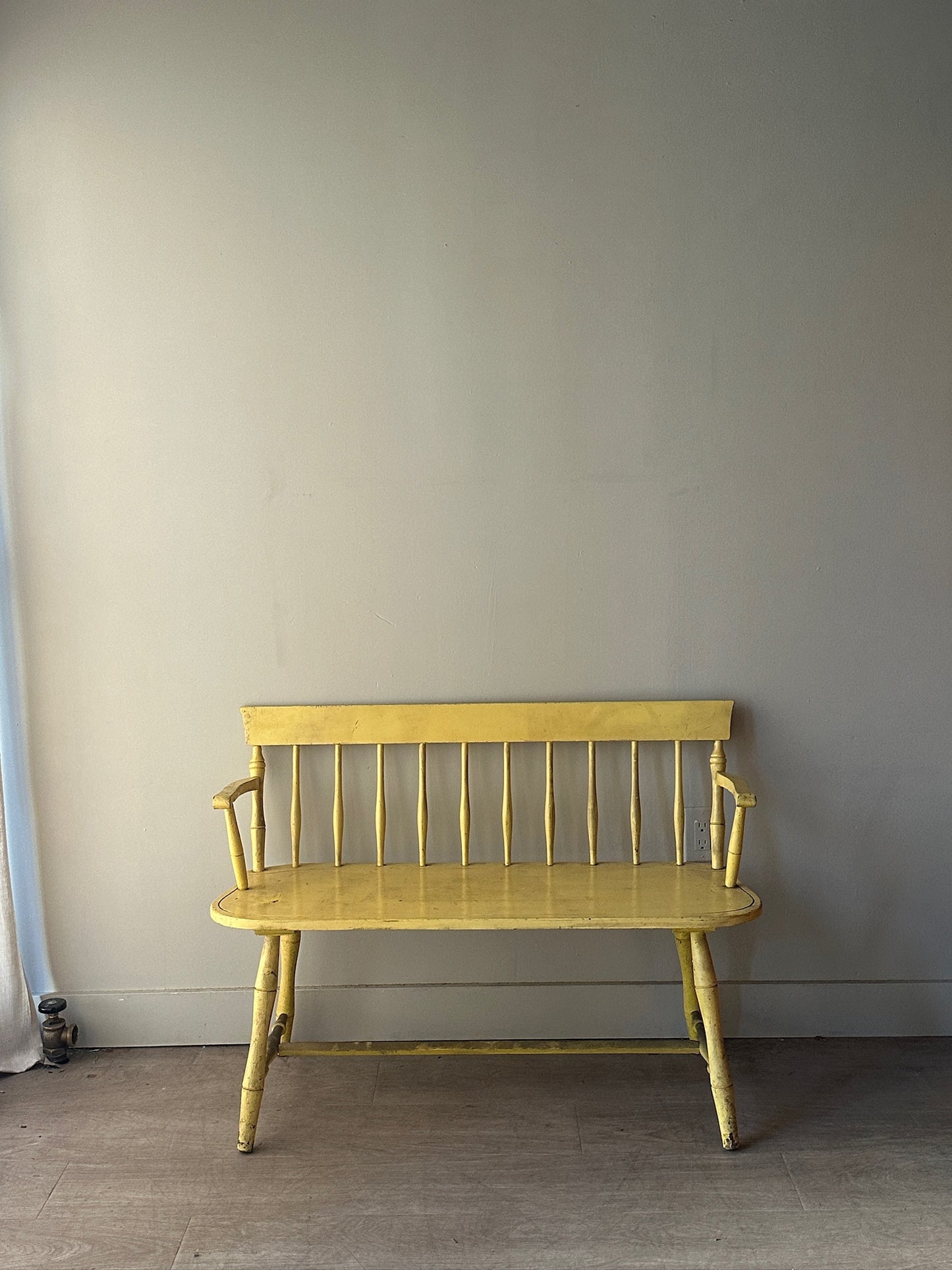 Yellow painted bench