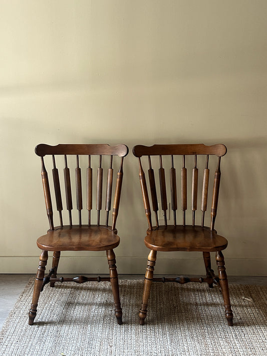 Windsor walnut chairs. Sold in pair.