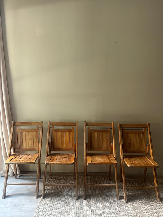 Pine folding chairs. Sold in pairs.