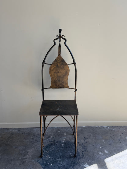 Wrought iron sculptural chairs (right)