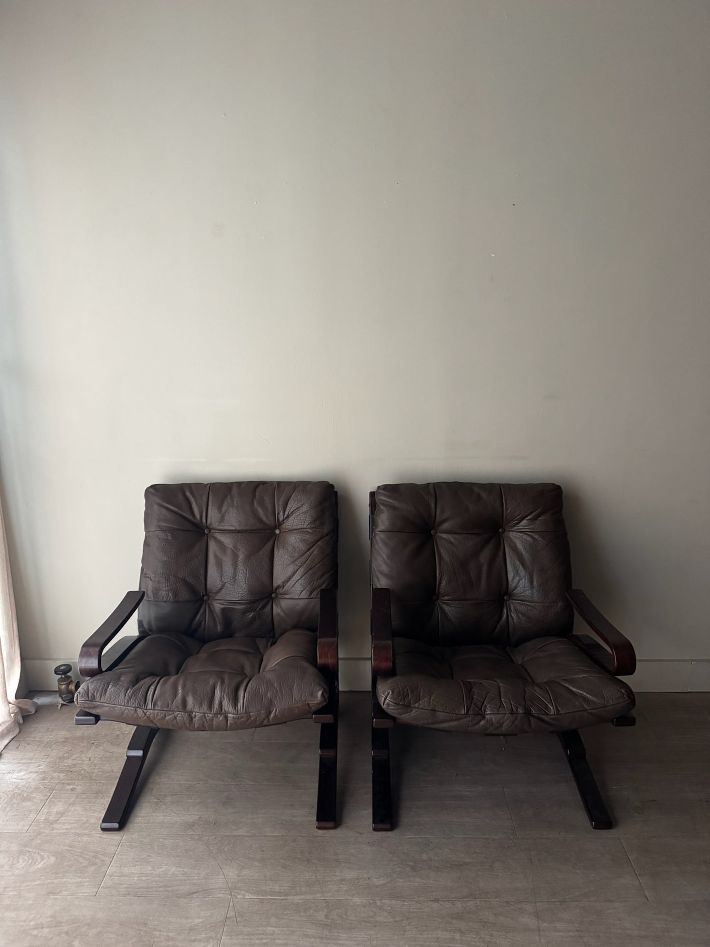 Einar Hove Norwegian brown leather lounge chairs. Sold individually.