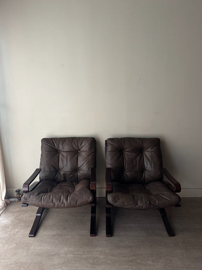 Einar Hove Norwegian brown leather lounge chairs. Sold individually.