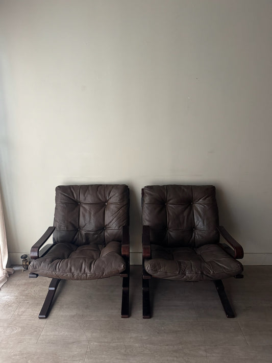 Einar Hove Norwegian brown leather lounge chairs. Sold individually.
