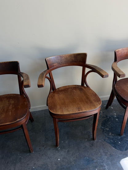 Thonet bentwood arm chairs. Sold in pairs.