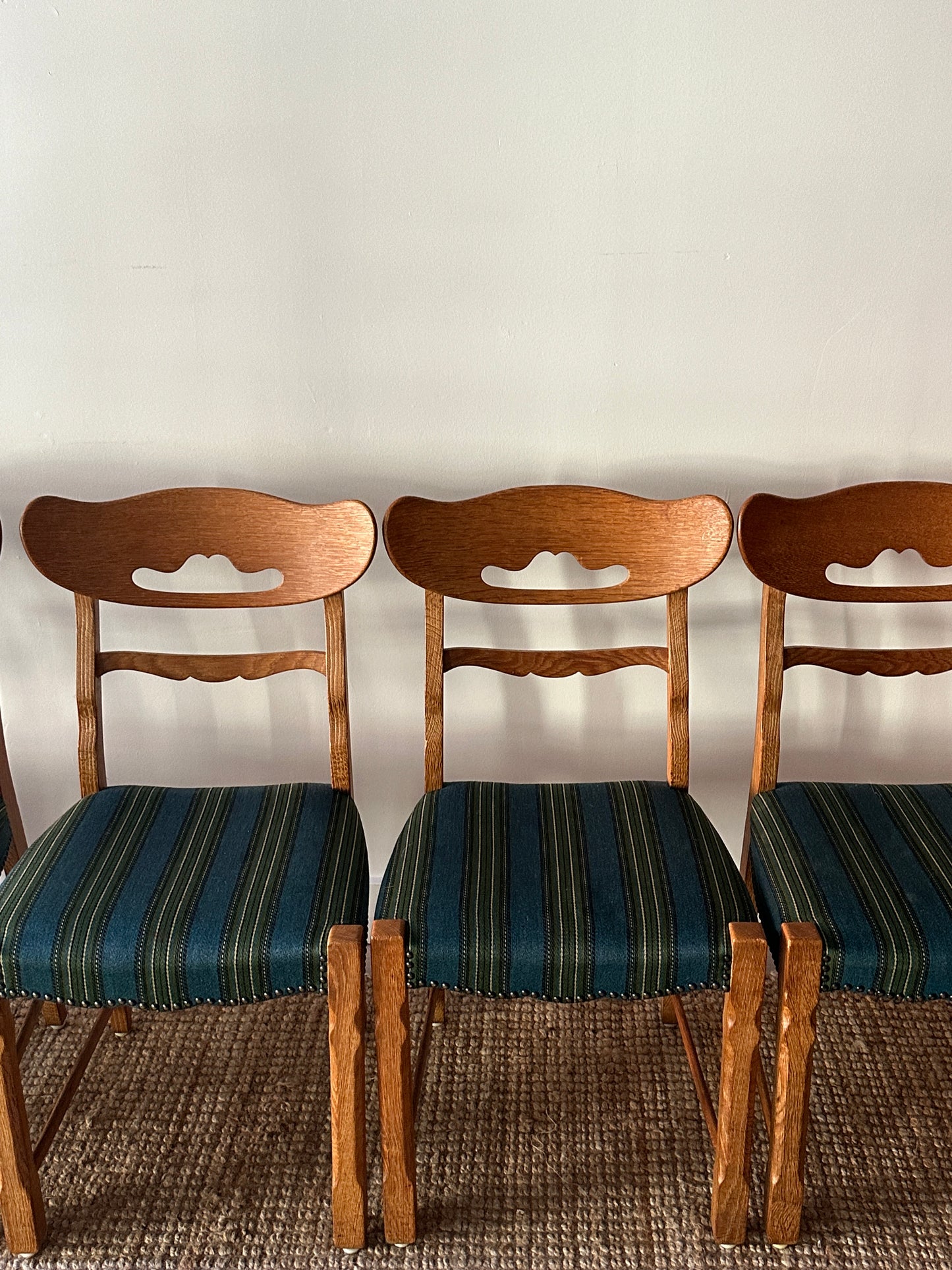 White oak wool and wool dining chairs sold in sets of 2