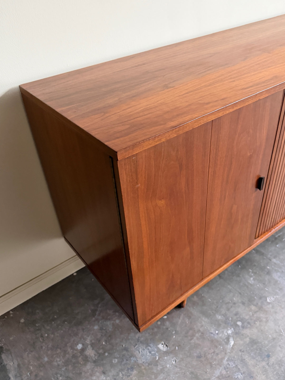 Walnut tambour door credenza