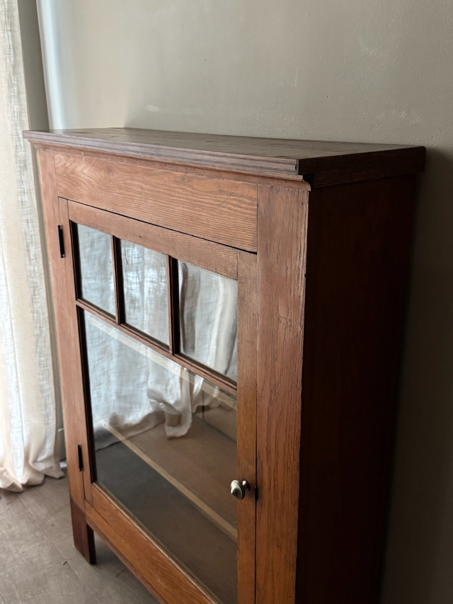 Golden oak display cabinet