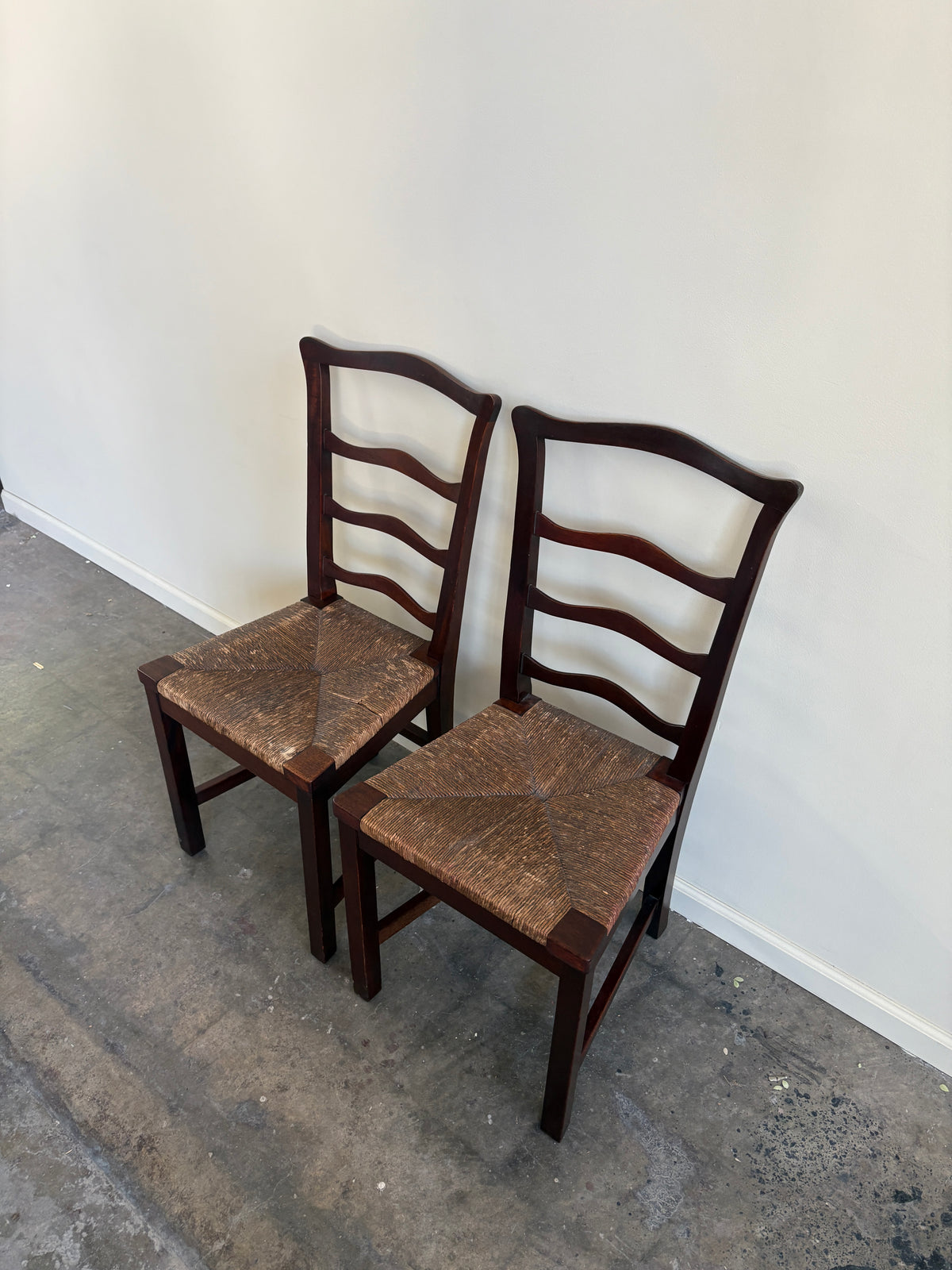 Flint & Horner mahogany rush seat dining chairs. Sold as a pair.