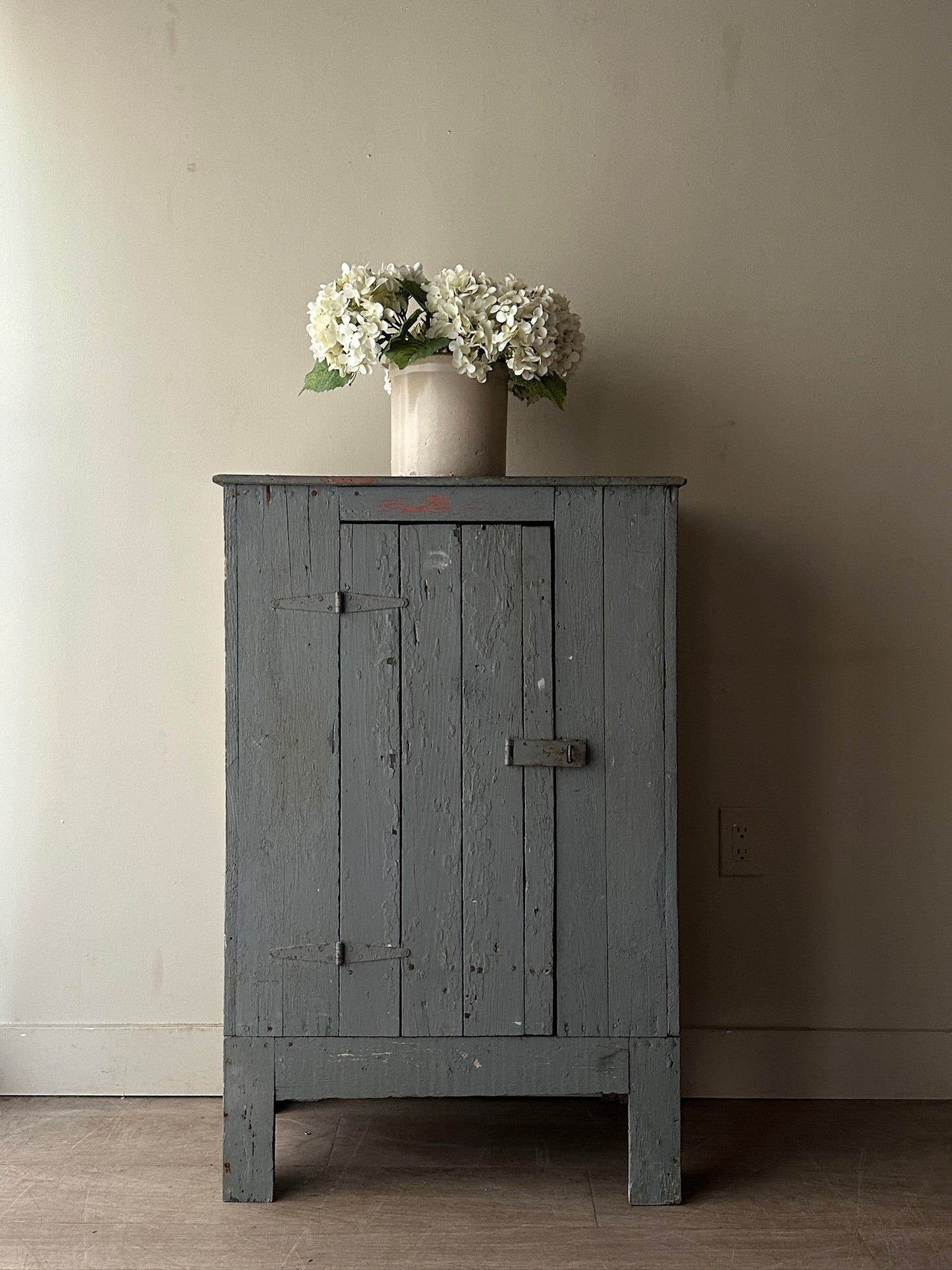 Blue painted cupboard