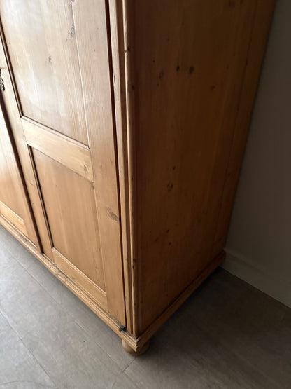 Gustavian waxed pine armoire