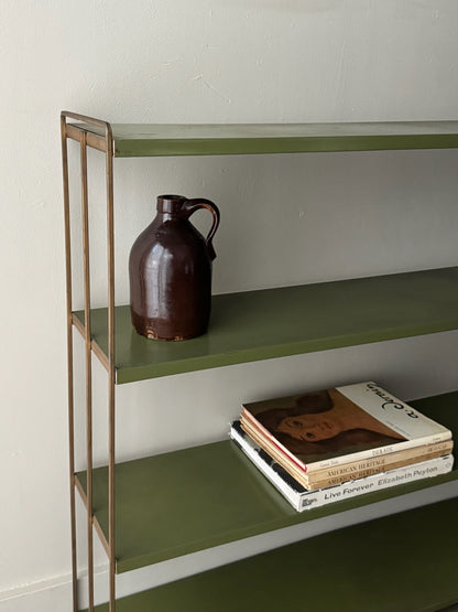 Green metal bookshelf
