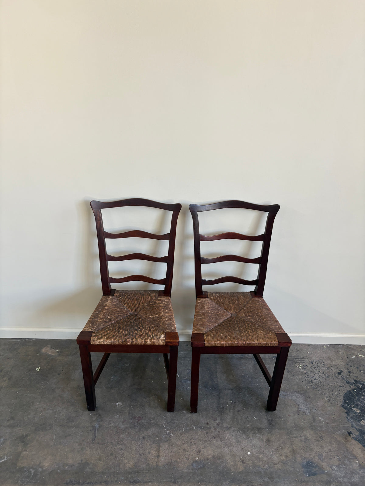Flint & Horner mahogany rush seat dining chairs. Sold as a pair.