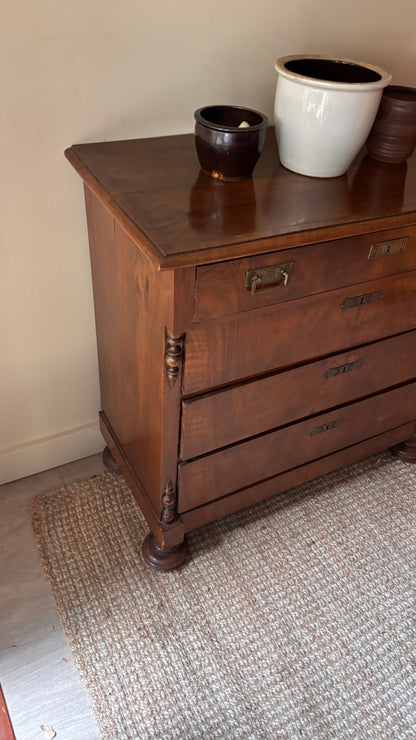 Walnut dresser with carved brass hardware
