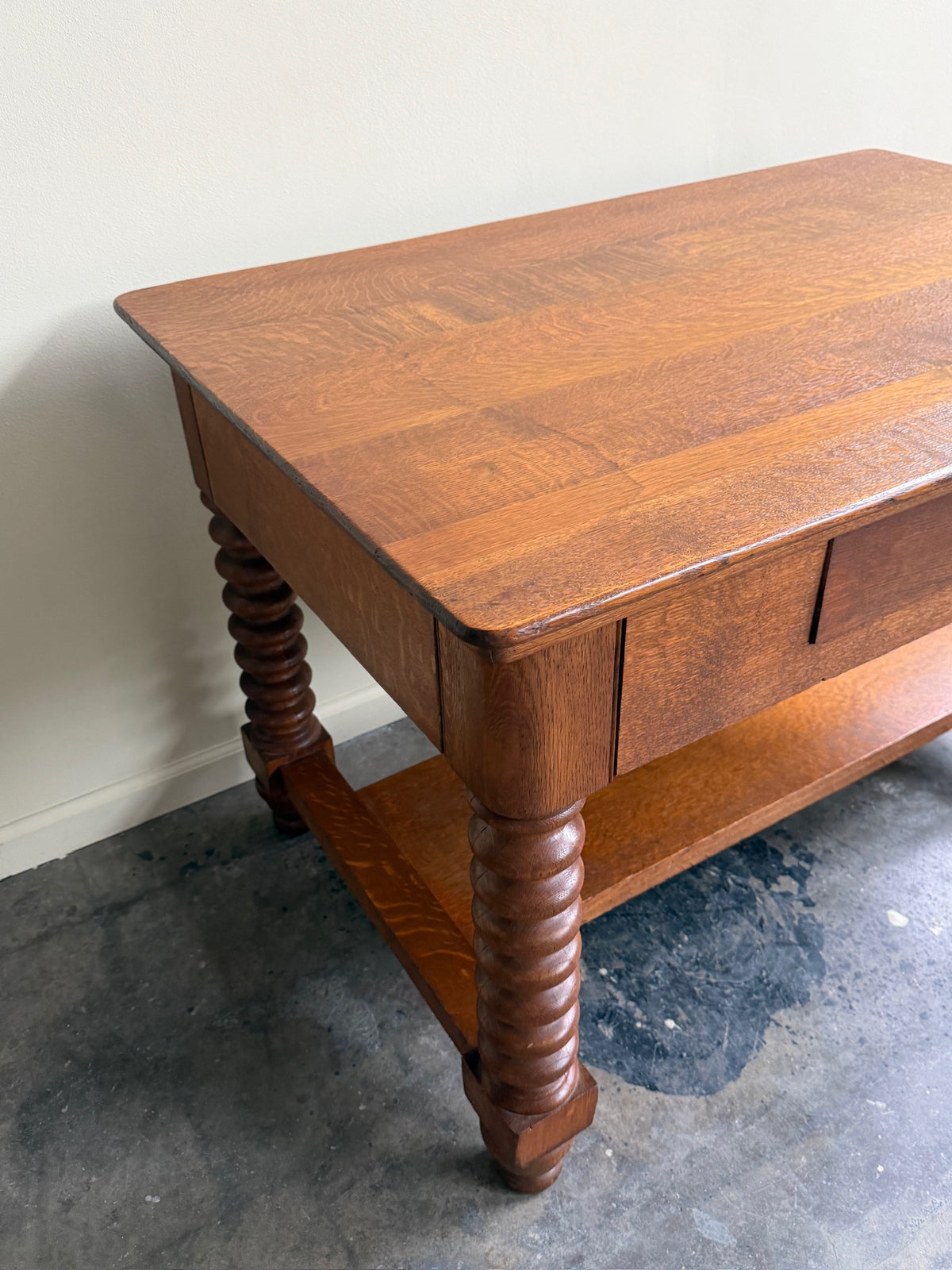 Golden oak spindle leg library table