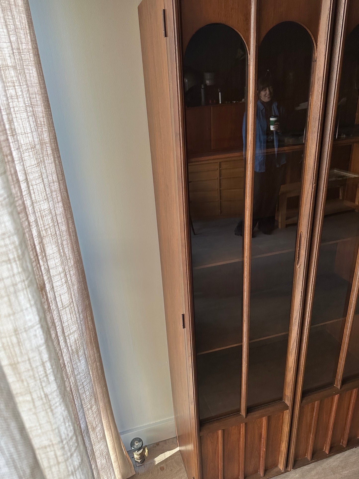 Walnut display cabinets. Sold individually.