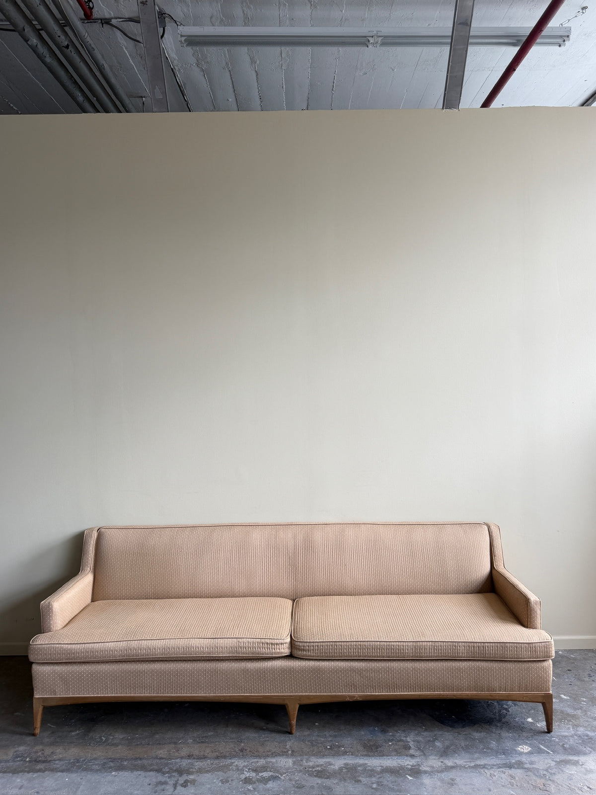 Tuxedo arm beige sofa