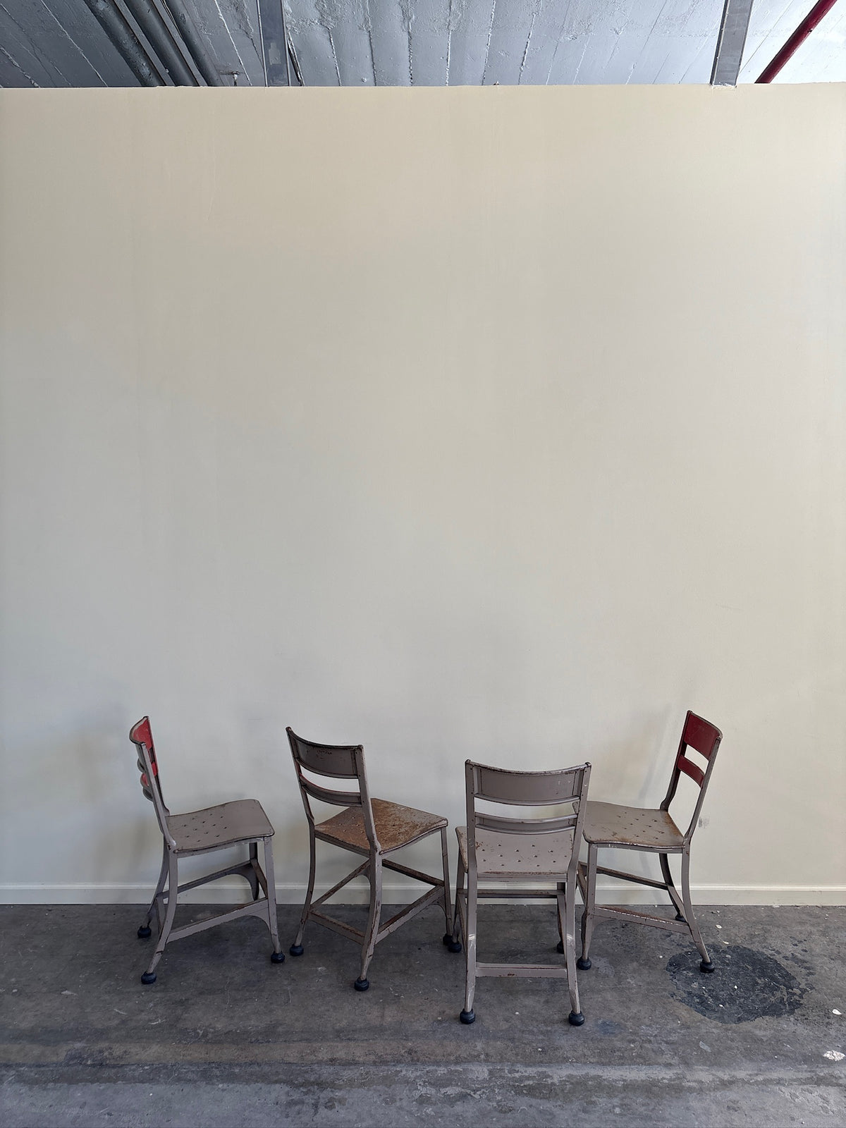 Industrial Toledo steel chairs. Sold in pairs.