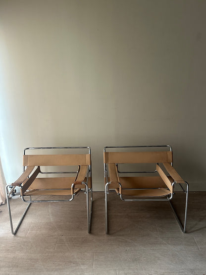 Tan Wassily chairs. Sold individually.