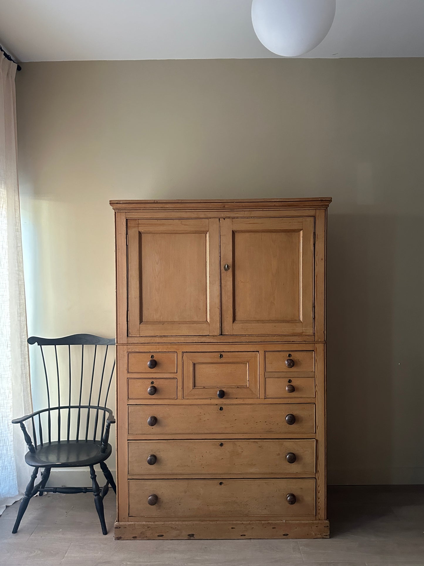 19th c. pine cabinet with updated sliding door mechanism.