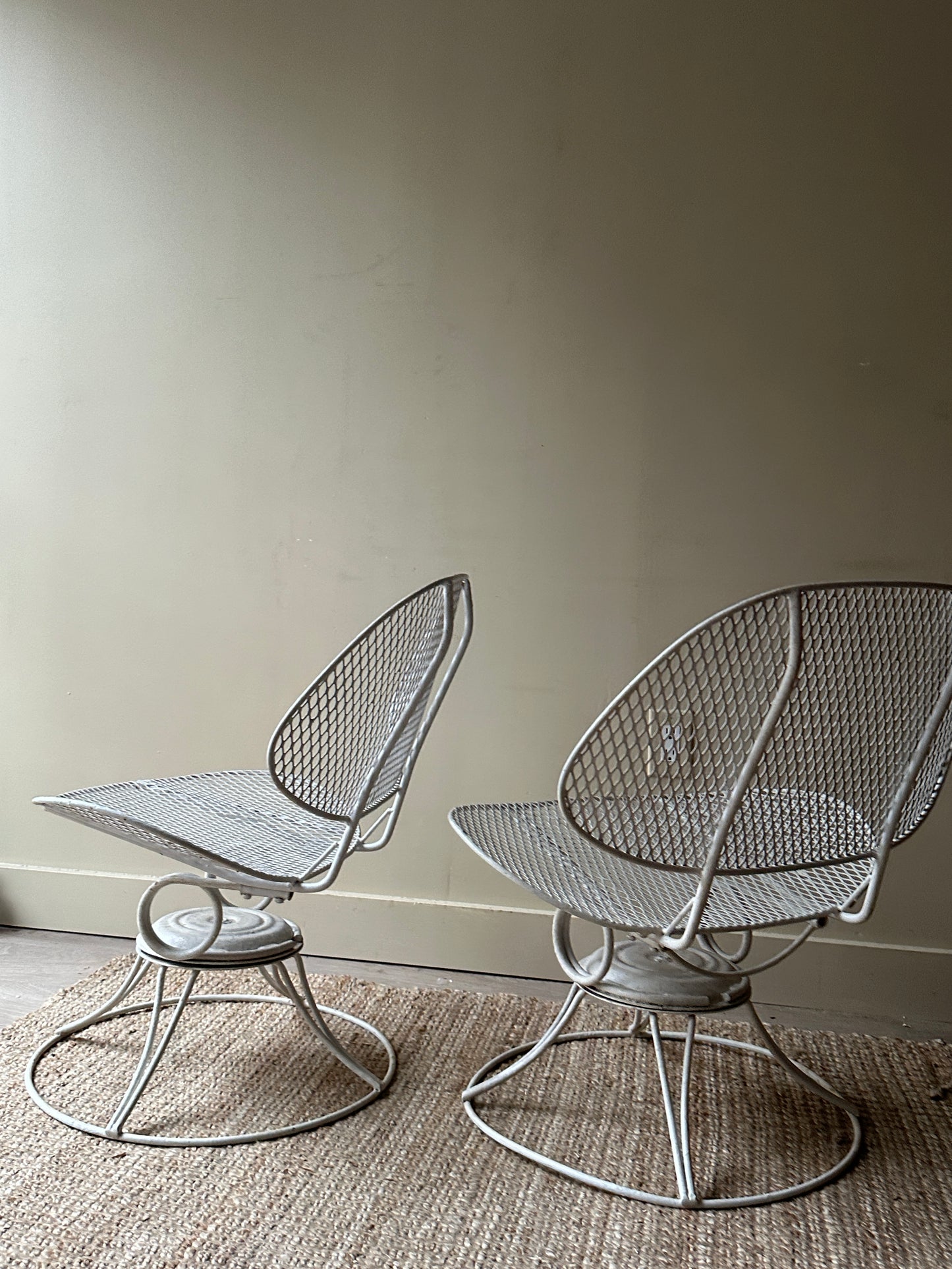 Homecrest metal clam shell swivel chairs. Sold as a set.