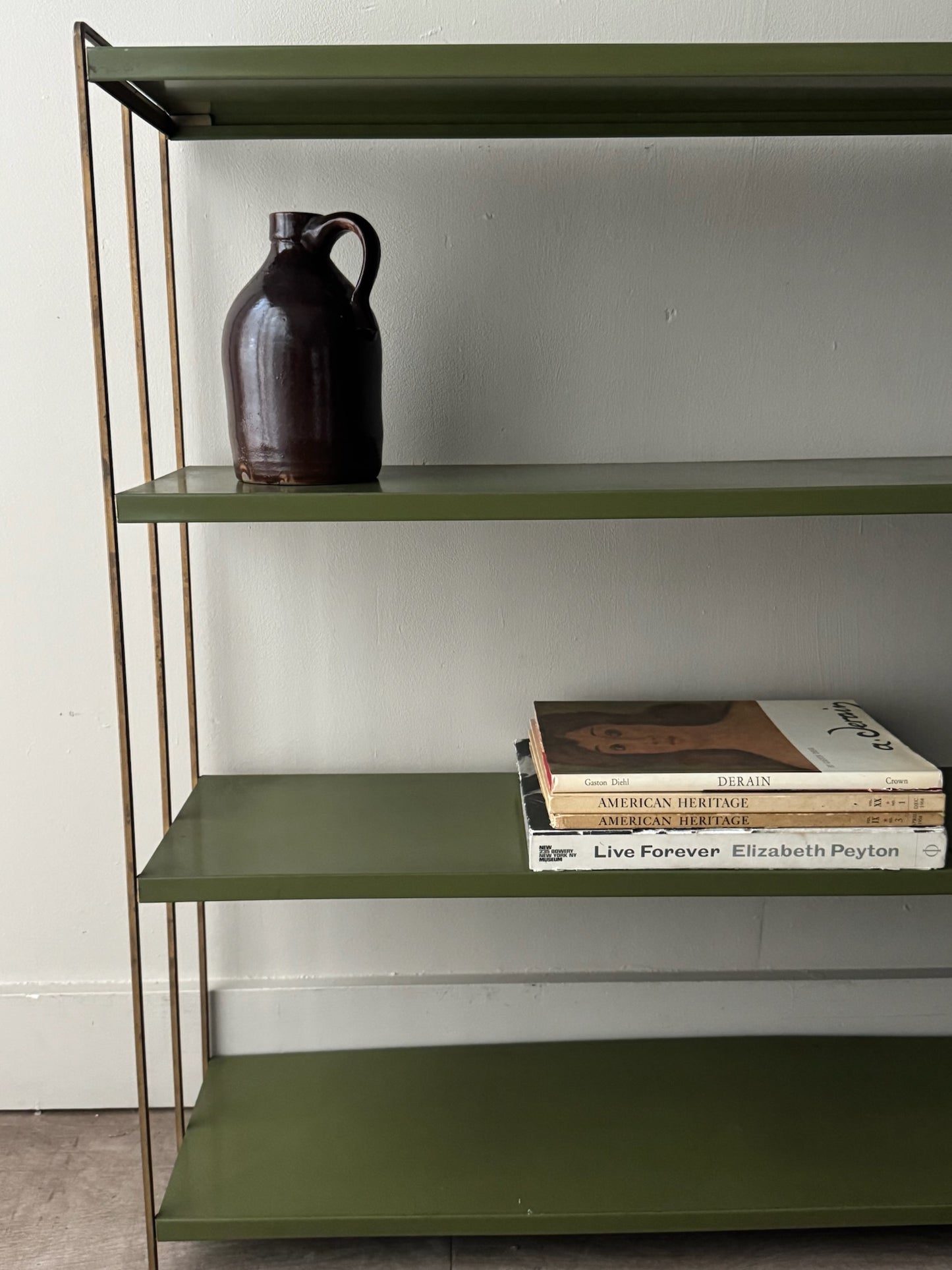 Green metal bookshelf