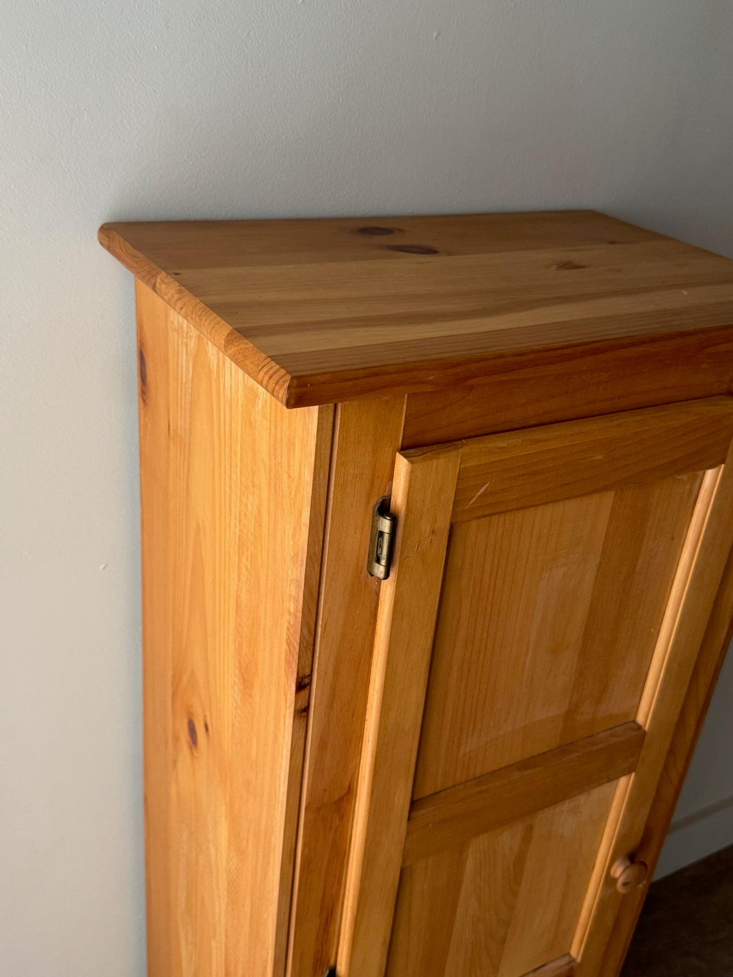 Narrow pine cupboard