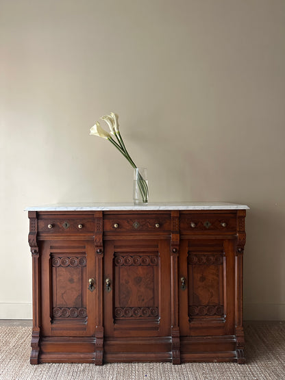 Carved walnut marble top sideboard
