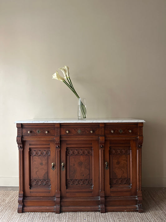 Carved walnut marble top sideboard
