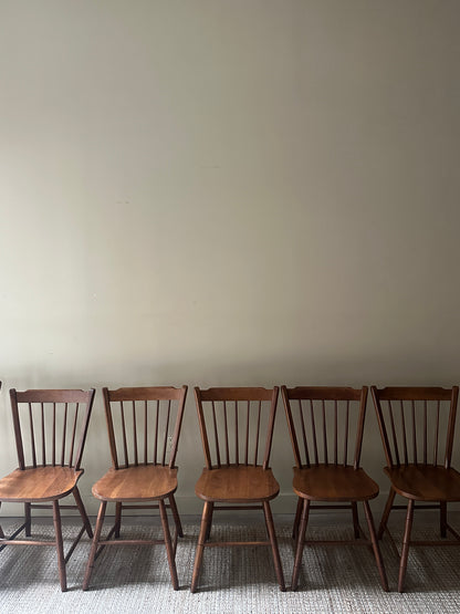 Set of 6 dining chairs. 5 armless, 1 captain. Sold as a set.