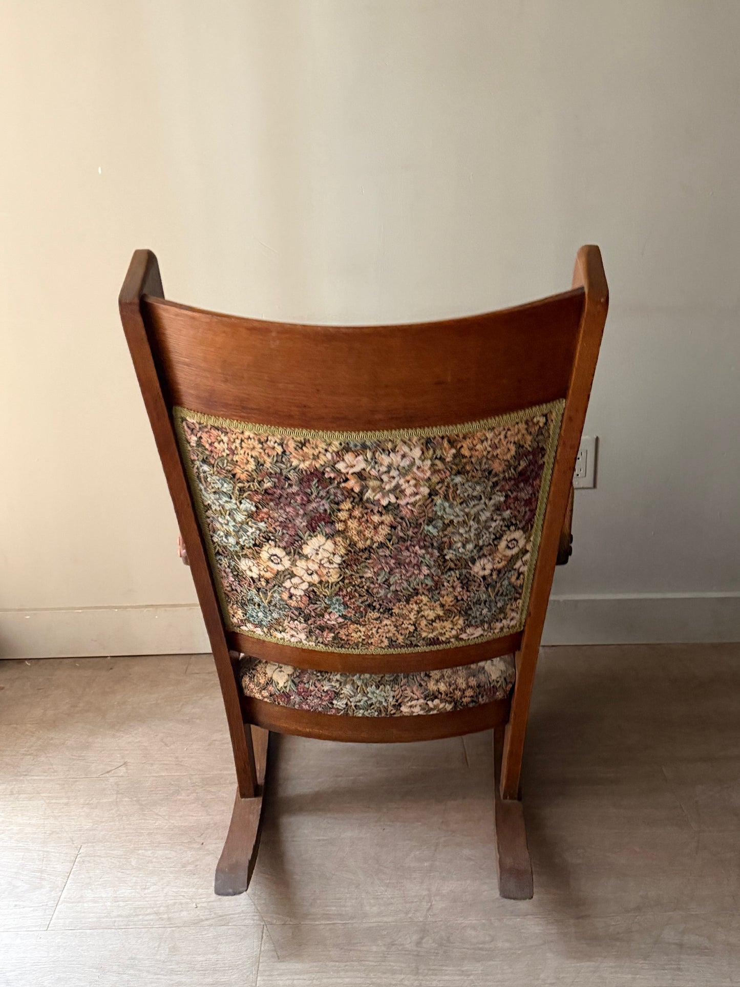 Upholstered golden oak rocking chair
