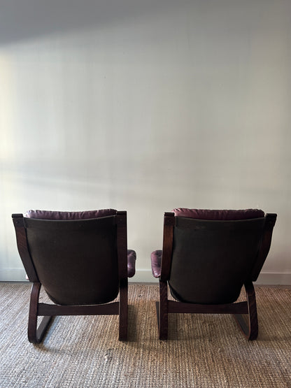 Danish bentwood leather lounge chairs. Sold individually.