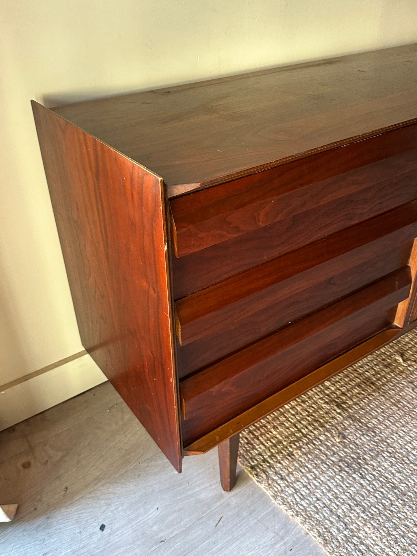 Walnut credenza with fluted doors