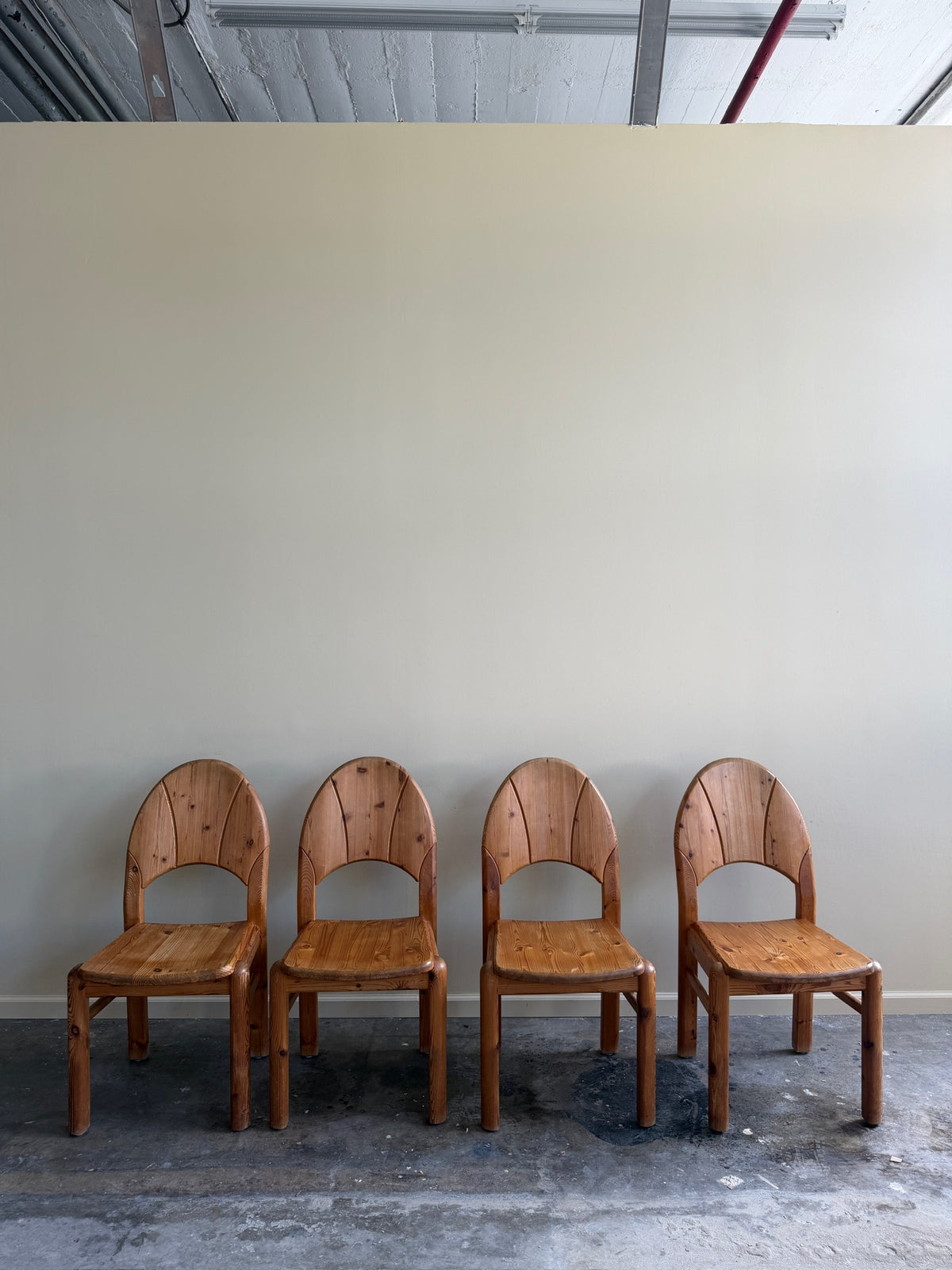 Danish pine dining chairs. Sold in pairs.