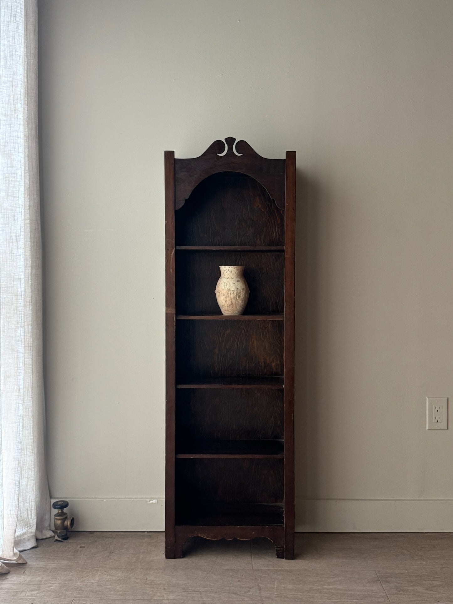 Narrow stained pine shelf
