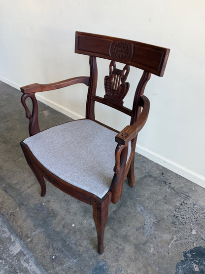 Carved mixed wood armchair