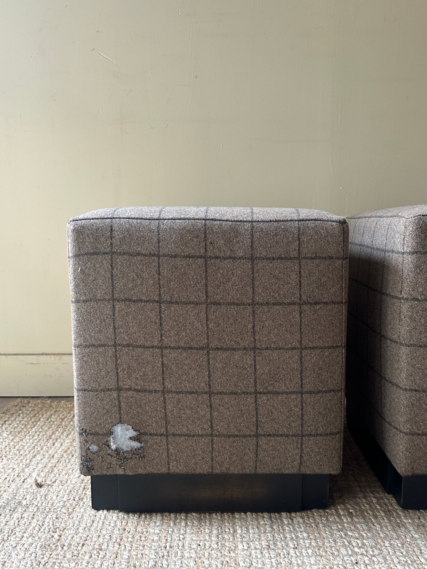 Wool ottomans. Holes in fabric on two sides.