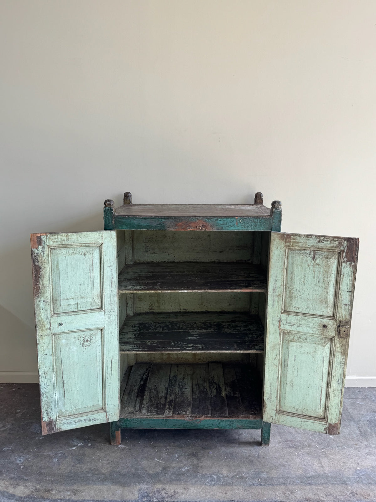 Green painted cupboard