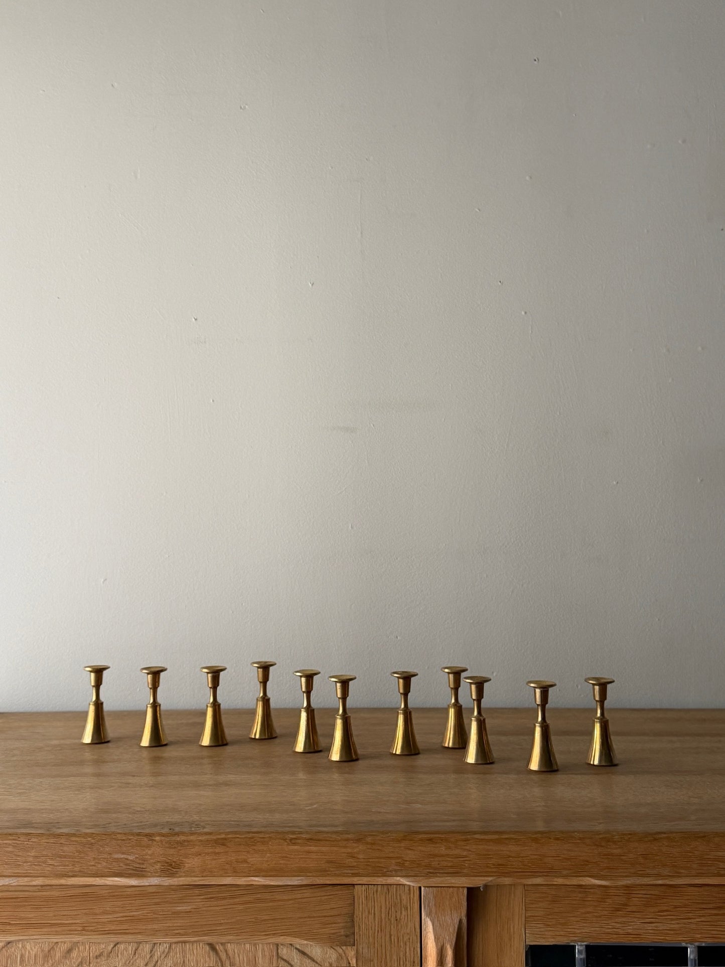Jens Quistgaard for Dansk brass candleholders. Sold in pairs.